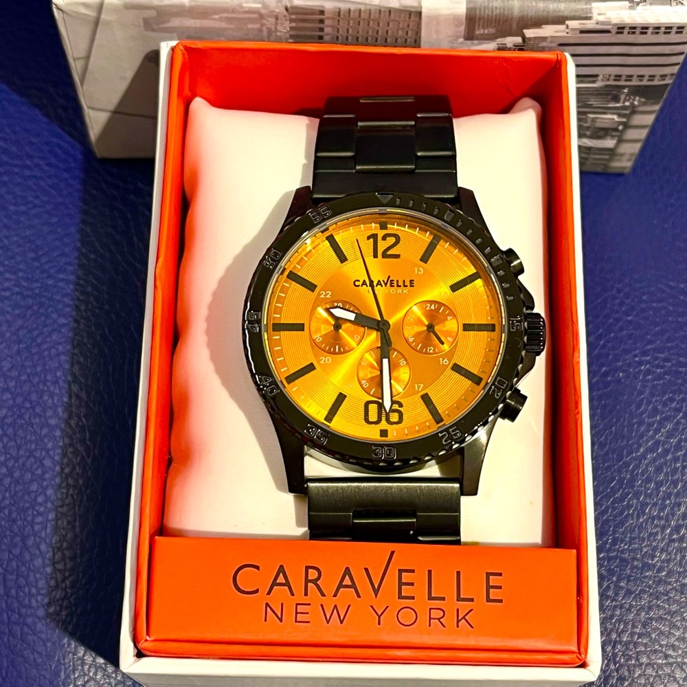 Caravelle New York by Bulova Watch Black Orange Dial